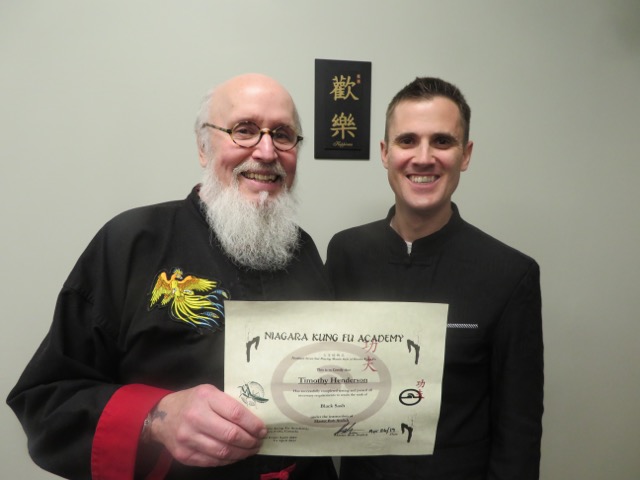 Timothy Henderson with Sifu Rob Atalick. (Submitted photo)